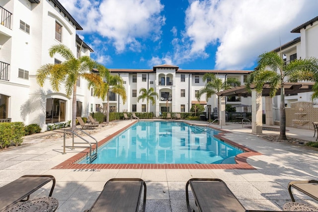 view of swimming pool featuring a patio area