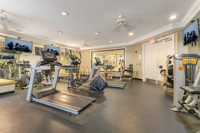 workout area with crown molding and a textured ceiling