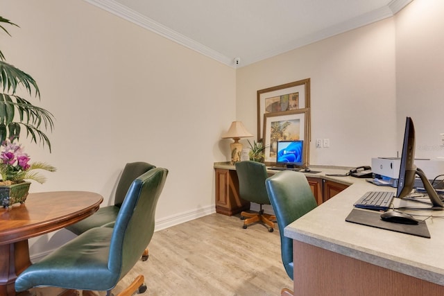 home office with ornamental molding and light wood-type flooring