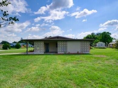 view of front of house with a front lawn