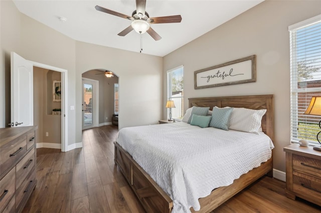 bedroom with dark wood-type flooring, ceiling fan, and access to outside