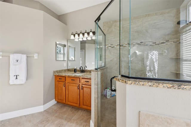 bathroom with vanity and an enclosed shower