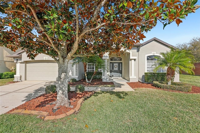 obstructed view of property with a garage and a front yard