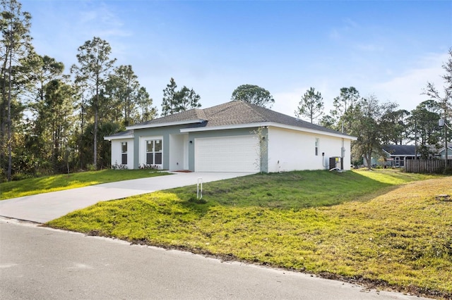 view of front facade featuring a garage and a front yard