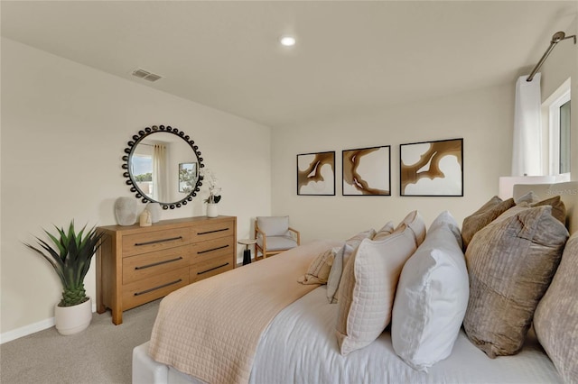 5879 Galloping Dr, Apopka, FL 32712 - bedroom with visible vents, baseboards, and light carpet