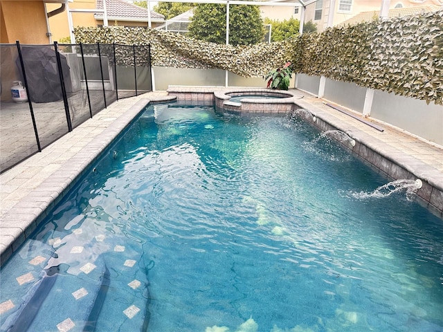 view of swimming pool featuring an in ground hot tub and pool water feature