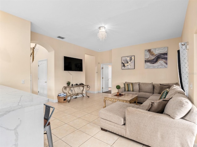 living room featuring light tile patterned floors