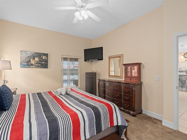 bedroom featuring ceiling fan and light colored carpet