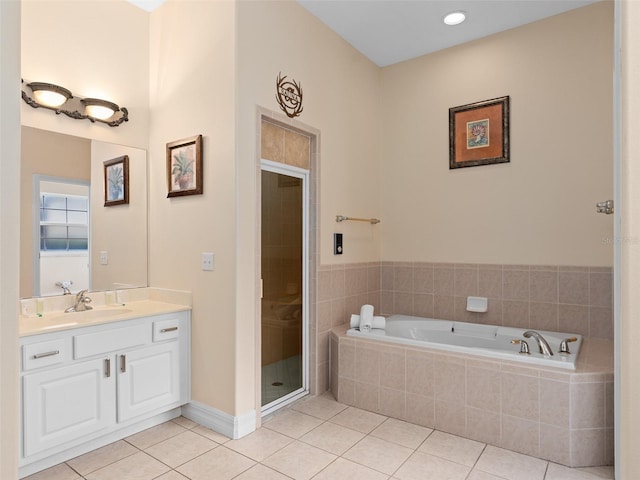 bathroom featuring tile patterned flooring, vanity, and independent shower and bath