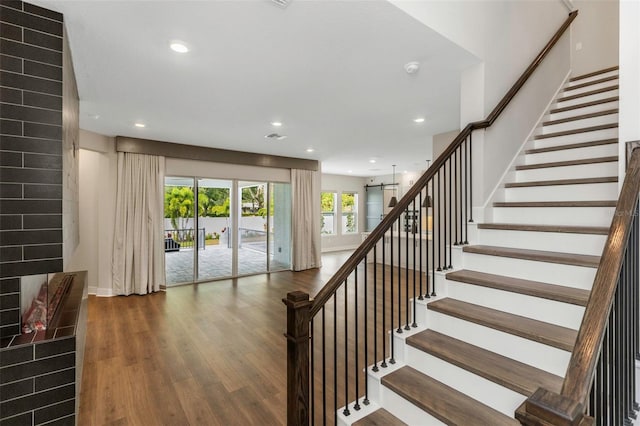 stairway with wood-type flooring