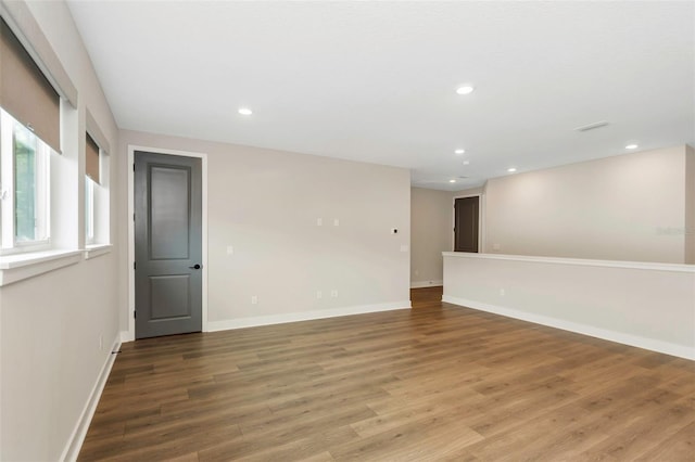 unfurnished room featuring wood-type flooring