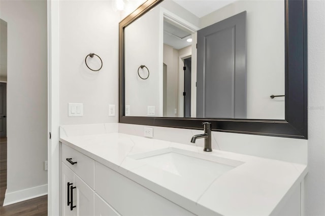 bathroom featuring vanity and wood-type flooring