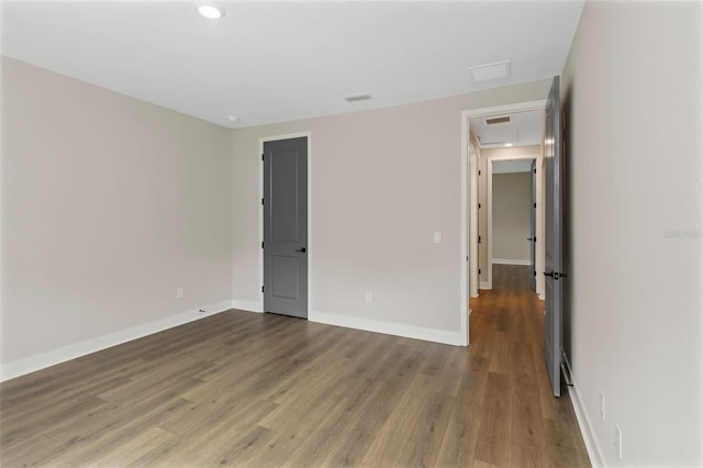 unfurnished bedroom featuring wood-type flooring