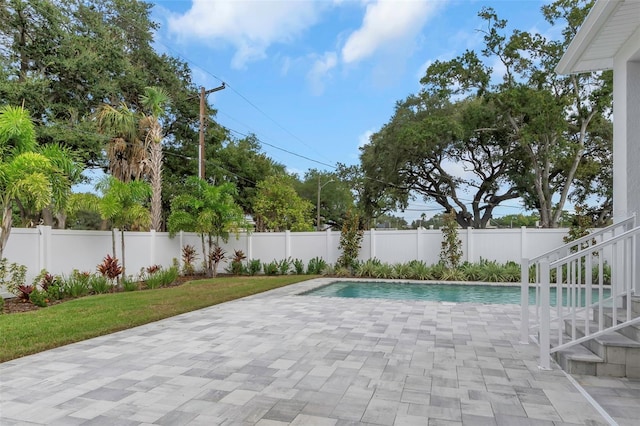 view of pool featuring a patio area