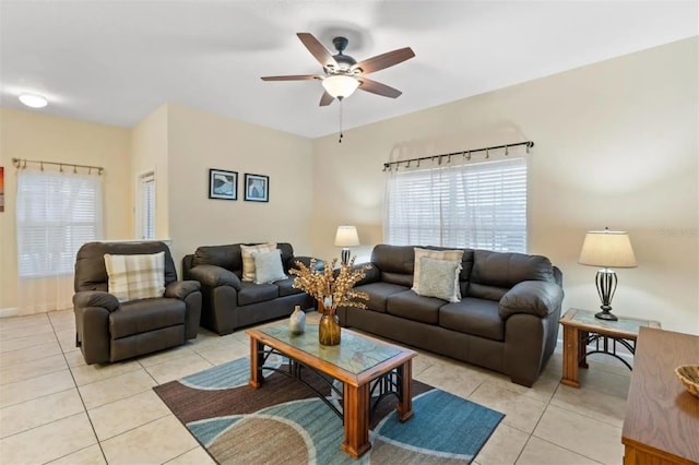 tiled living room featuring ceiling fan