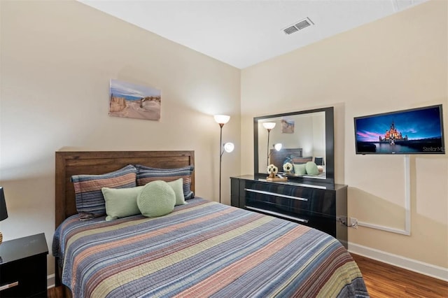 bedroom featuring hardwood / wood-style floors