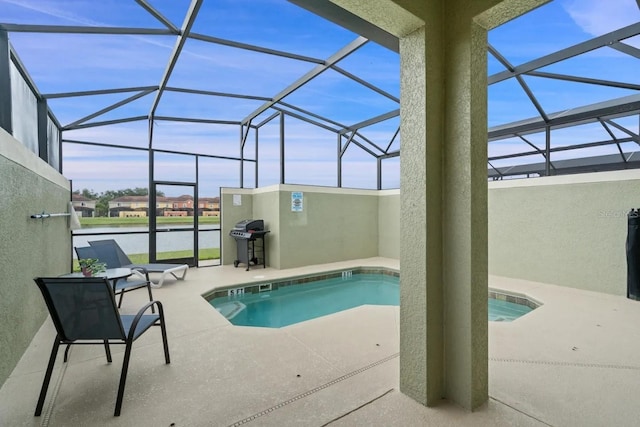 view of swimming pool featuring grilling area, a lanai, a patio area, and a water view