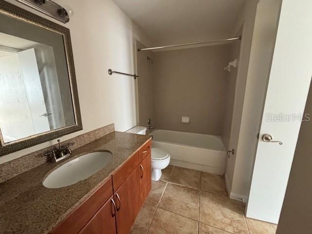 full bathroom with vanity, bathing tub / shower combination, tile patterned floors, and toilet