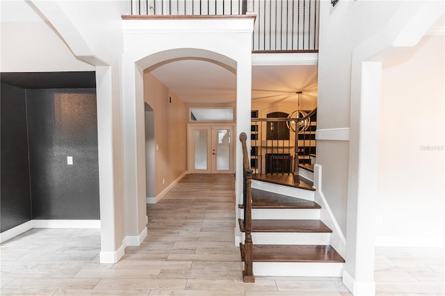 stairway featuring hardwood / wood-style floors