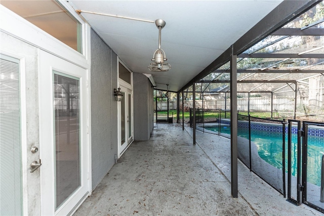 view of pool featuring a lanai and a patio area