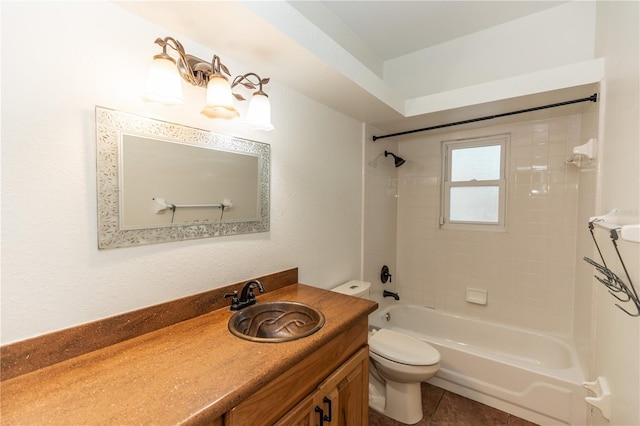 full bathroom with vanity, toilet, and tiled shower / bath combo