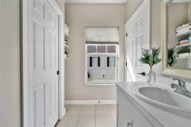 bathroom with vanity and tile patterned flooring