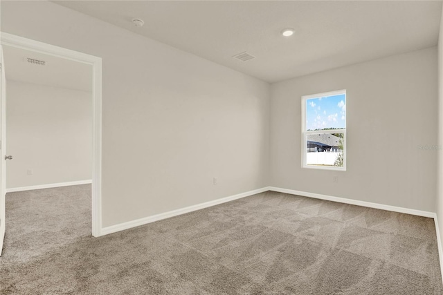 view of carpeted spare room