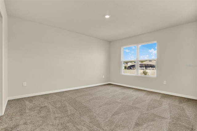 unfurnished room with carpet