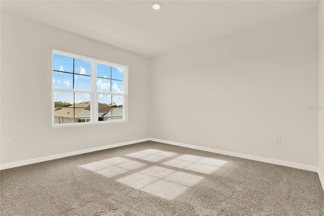 view of carpeted spare room