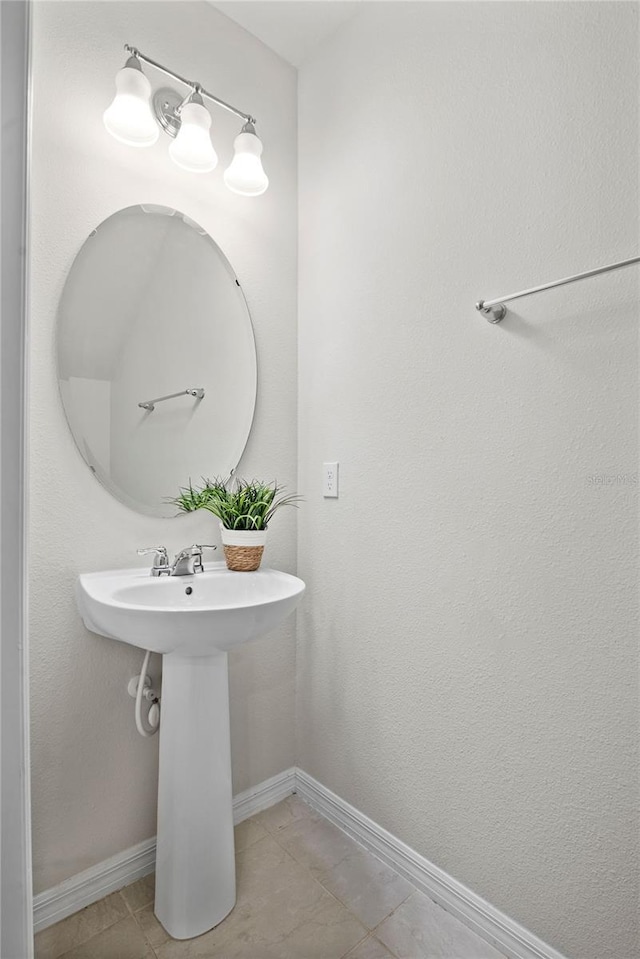 bathroom featuring tile patterned flooring