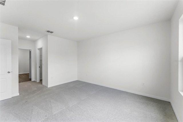 unfurnished room with carpet floors