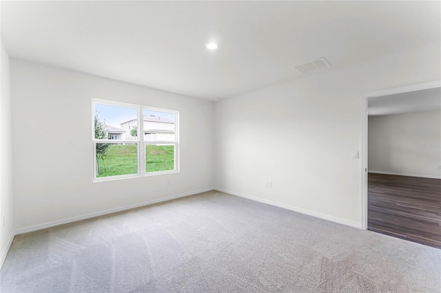 view of carpeted spare room