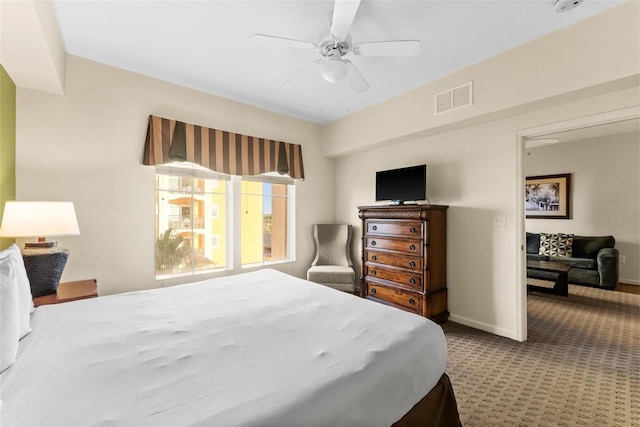 carpeted bedroom featuring ceiling fan