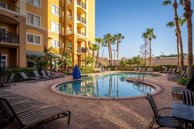 view of swimming pool featuring a patio