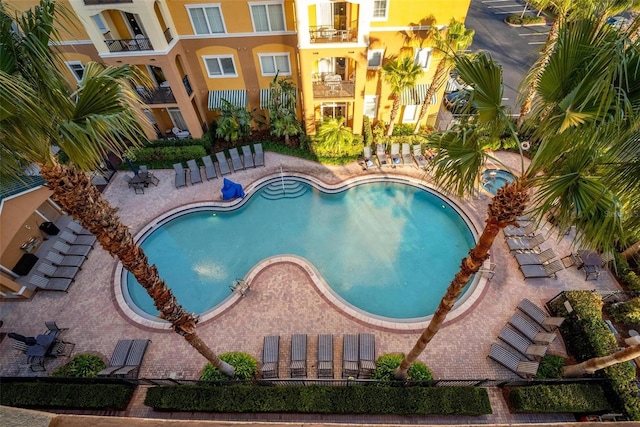 view of swimming pool featuring a patio area