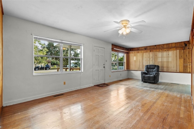 unfurnished room featuring ceiling fan and light hardwood / wood-style flooring