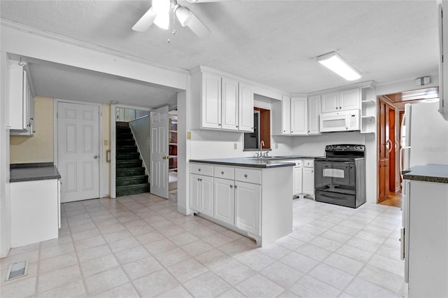 kitchen featuring white cabinetry, sink, a textured ceiling, and white appliances