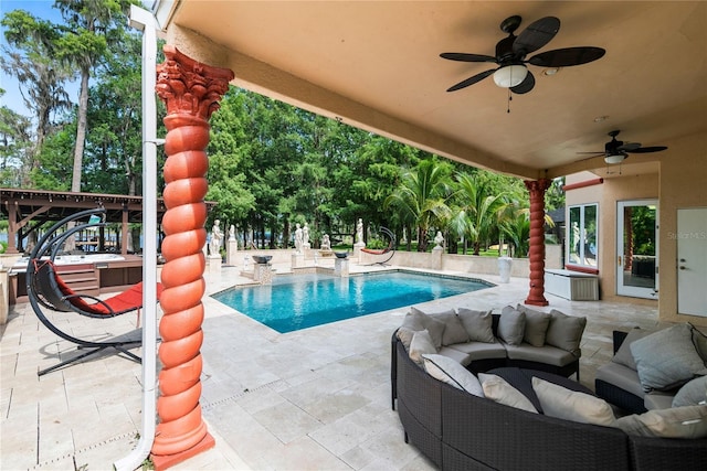 view of pool featuring an outdoor hangout area, a patio, and ceiling fan