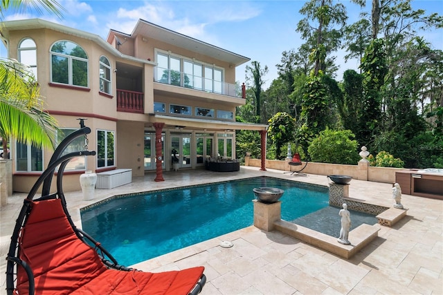 view of pool featuring a patio area