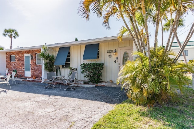 view of front of property with a patio