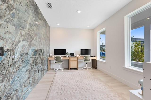 office area featuring tile walls