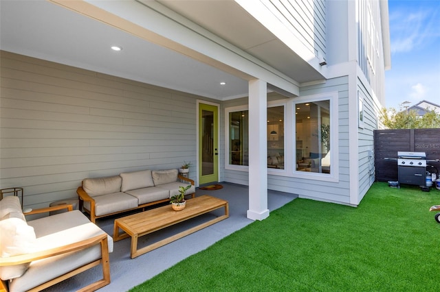 view of patio with grilling area and an outdoor hangout area