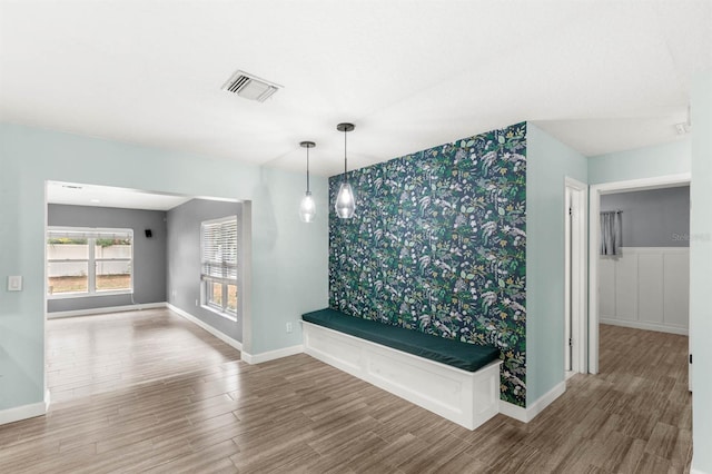 corridor featuring hardwood / wood-style floors