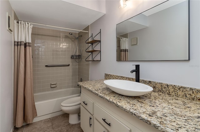 full bathroom featuring vanity, shower / bath combination with curtain, and toilet