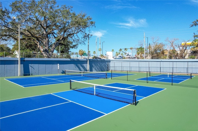 view of tennis court with basketball court