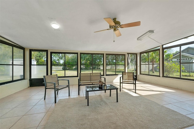 sunroom / solarium with ceiling fan and plenty of natural light