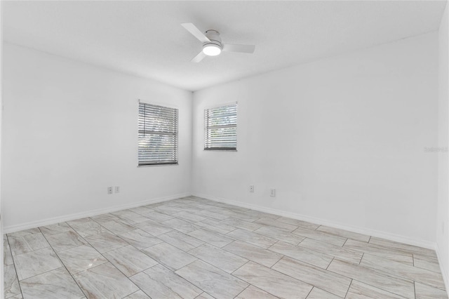 spare room featuring ceiling fan