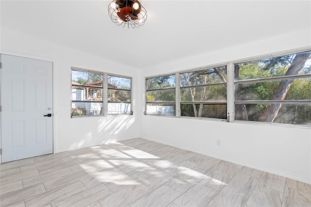 view of unfurnished sunroom