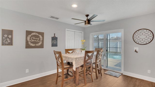 dining area featuring ceiling fan and hardwood / wood-style floors