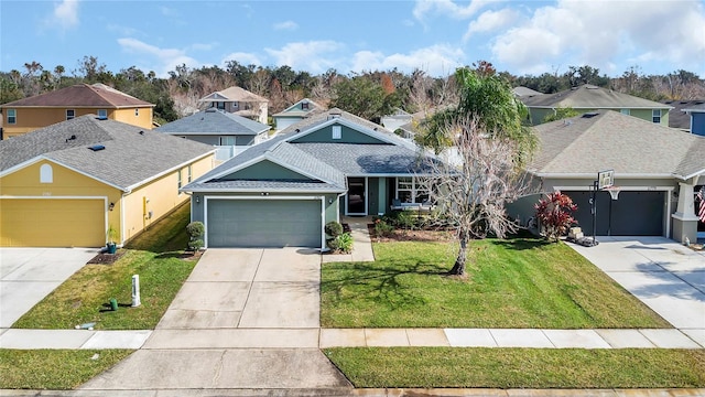 view of front of property featuring a garage and a front lawn